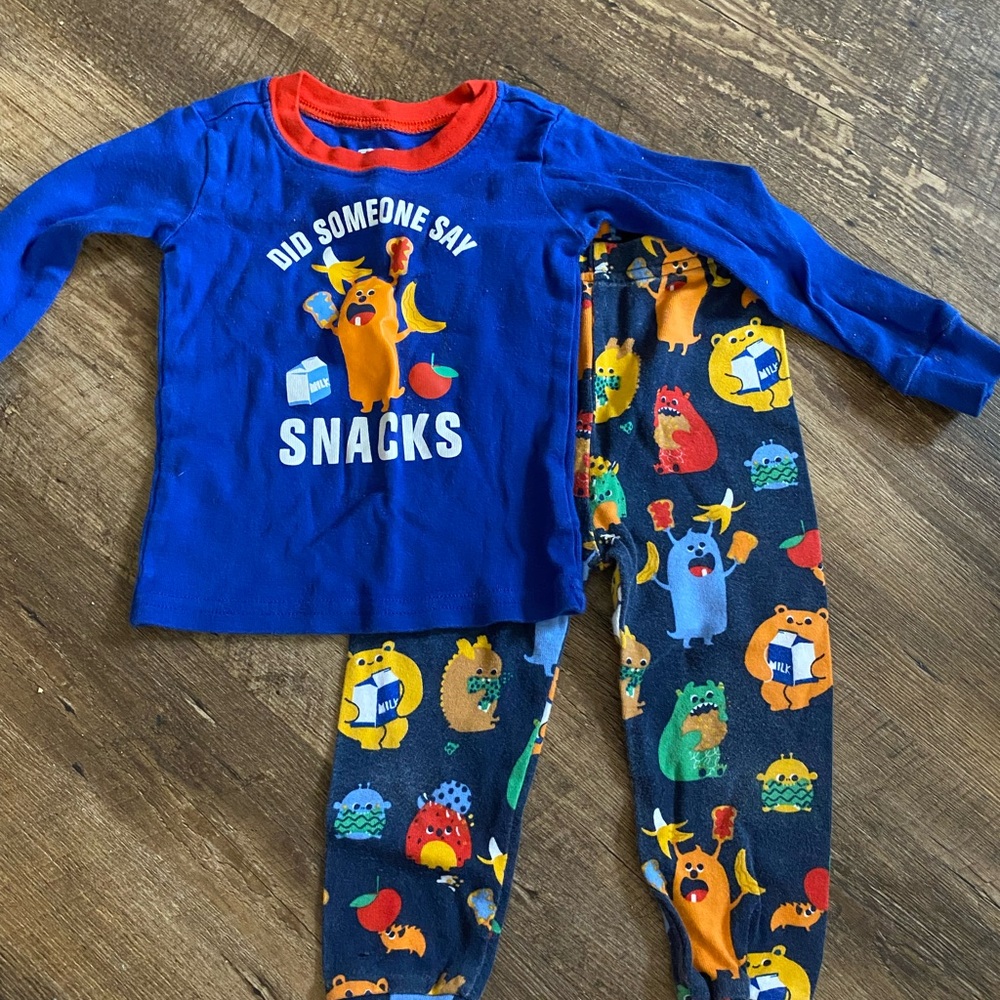 Vibrant Blue and Red Pajama Set with Playful Monster Design